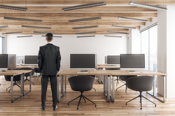 Canvas Print - Businessman in modern coworking office