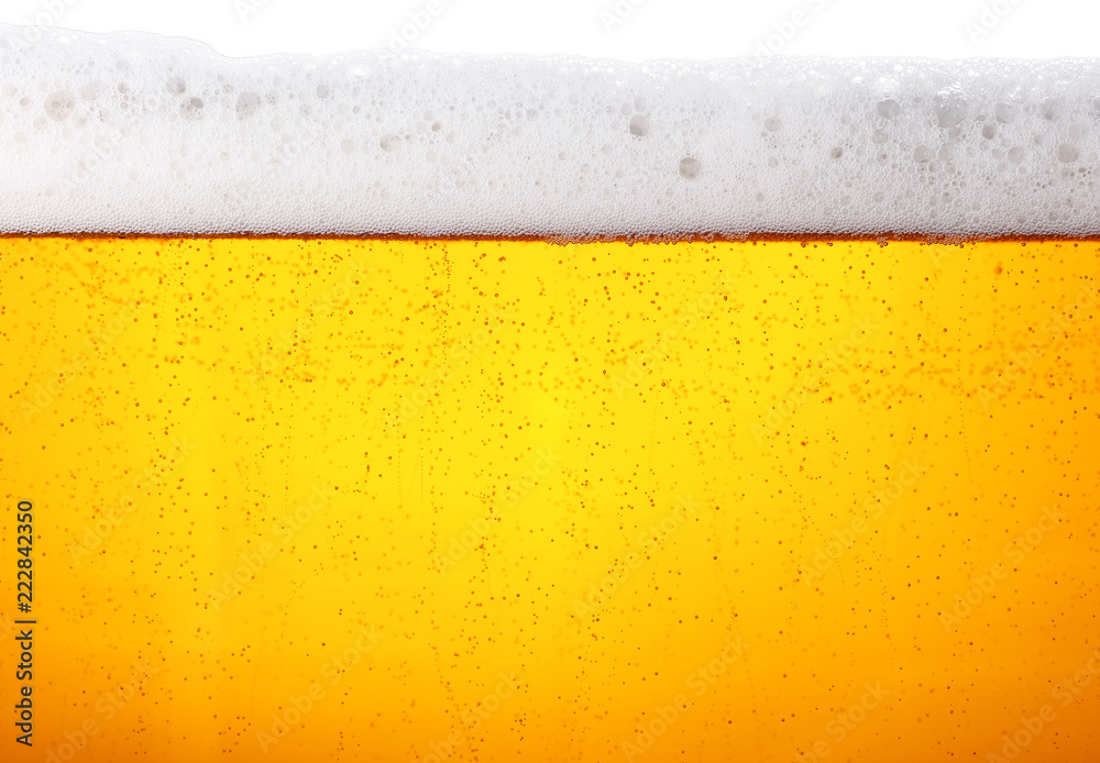Close up background of beer with bubbles in glass - obrazy, fototapety, plakaty 
