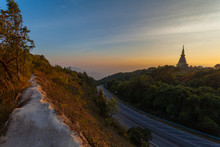 Sunset Between Noppamethanedol And Noppapol Phumsiri Pagoda On Doi Inthanon National Park..Doi Inthanon National Park Is The Highest Mountain Of Thailand
