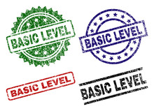 BASIC LEVEL Seal Prints With Corroded Style. Black, Green,red,blue Vector Rubber Prints Of BASIC LEVEL Title With Dirty Style. Rubber Seals With Circle, Rectangle, Medallion Shapes.