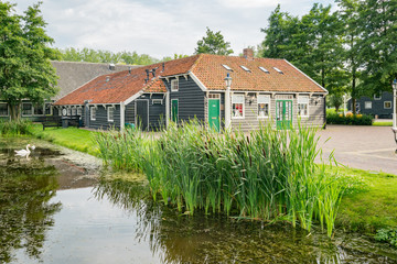 Beautiful Dutch houses with reflection at Zaandijk