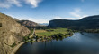 Aerial panoramic view of Okanagan Hwy near Vaseux Lake during a sunny summer day. Located between Oliver and Penticton, BC, Canada.