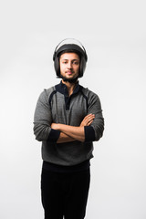 Handsome Indian/asian man in helmet over white background with different expressions