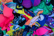 Women Bikini Swimsuits In A Basket At Summer Street Market.