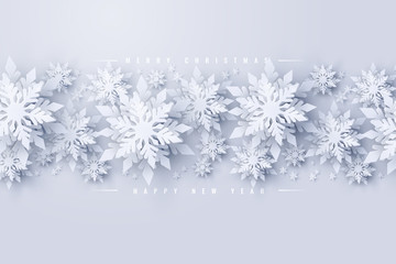 Wall Mural - vector merry christmas and happy new year background with realistic looking paper cut snowflakes. se