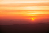 Fototapeta Zachód słońca - Dramatic sunset and sunrise over mountain morning twilight evening sky.