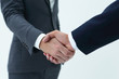 © ASDF - Businessman by handshake invites to cooperation.