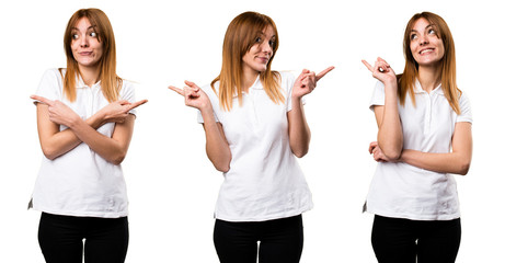 Wall Mural - Set of Beautiful young girl pointing to the laterals having doubts