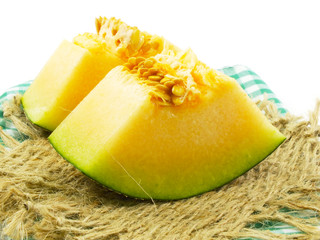 Poster - close up of cantaloupe melon slices on white background