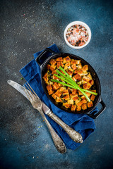 Traditional Thanksgiving, Christmas stuffing in baking pan, dark blue concrete background top view copy space