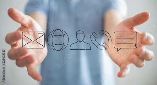 Fotografía Businessman using thin line contact icon