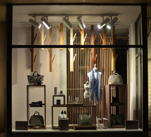 Boutique Window With Shoes, Bags And Mannequin.