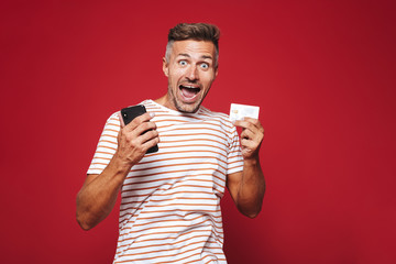 Poster - Portrait of an excited man standing over red