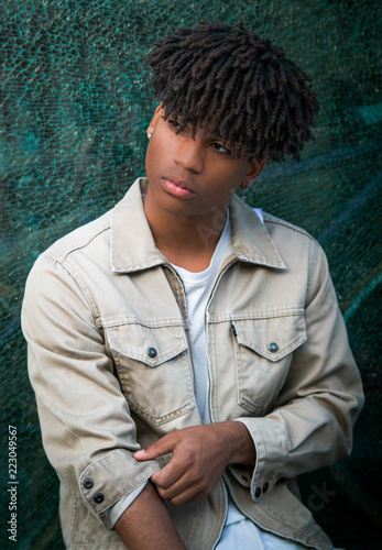 Hispanic Black Young Man Model With Afro Curly Hair Portrait