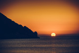 Fototapeta Zachód słońca - Sunset or sunrise over sea surface