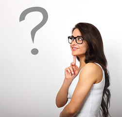 Beautiful positive business woman profile view with folded arms in glasses thinking and looking up on creative question mark on white background