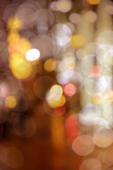 Wall Mural - Blurry background image of defocused colorful lights at night