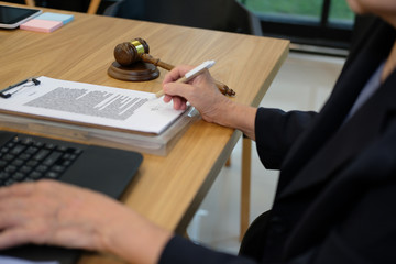 judge work with document computer. legal law gavel at courtroom. lawyer attorney justice at court