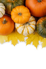 Wall Mural - Pumpkins and leaves on white