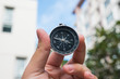© stationidea - Hand with compass.