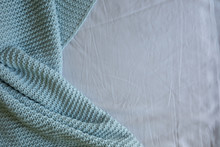 Handmade Blue Knitted Wool Blanket On Bed, Knitting Wool Texture Background