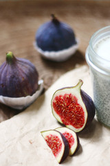 Wall Mural - fresh figs on wood