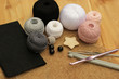 crochet pink, grey, black crochet materials, copy space