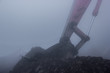 excavating in the fog