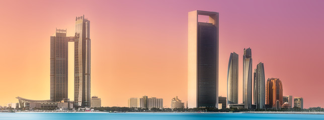 Wall Mural - View of Abu Dhabi Skyline at sunrise, UAE