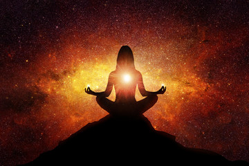 silhouette of woman with universe background