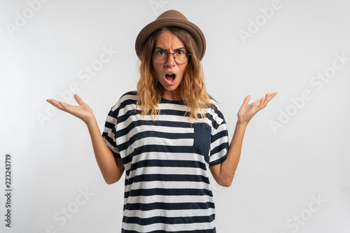 Fotografie, Obraz complaining and very unhappy woman isolated over white background