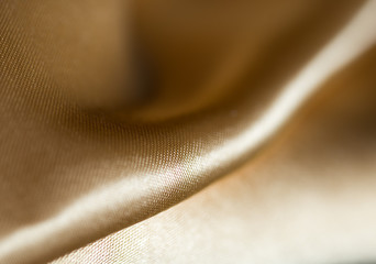 Background of yellow fabric silk macro