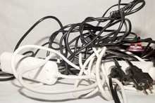 Shot Of Some Cables Cluttered In A Residential Home