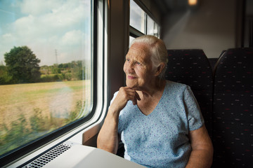 elderly woman in the train