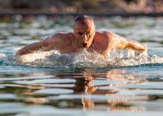 Man swimming butterfly style 