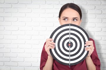 Sticker - Beautiful businesswoman portrait holding round target