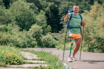 Wall Mural - Joyful man with paralysis ejoying active way of life