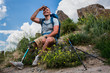 © shevchukandrey - Joyful young man with prosthesis resting outdoors
