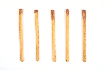 Wall Mural - biscuit sticks with sweet filling on white background.