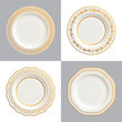 Vector illustration of decorative white plates with gold trims and ornamental borders; isolated on white and dark backgrounds.