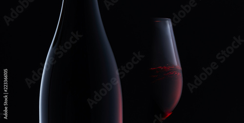 Fotografie, Obraz A bottle of wine and a glass with wine on a black background