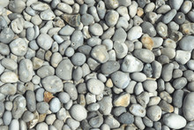 All Rounded Tiny Pebbles From Beach, A Natural Summer Background, Smooth Polished Pebble Stones