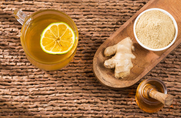 Wall Mural - Hot drink of ginger, lemon and honey - Zingiber officinale