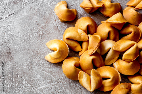 Photographie Many Chinese fortune cookie close up on concrete background