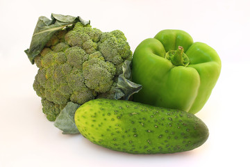 Wall Mural - Green vegetables on a white background isolated