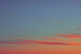 Fototapeta Zachód słońca - sunset half moon pink clouds.