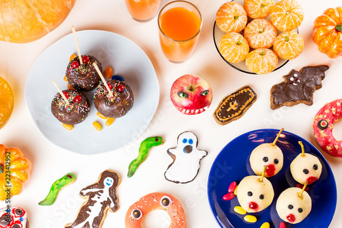 Halloween Sweet Treats Party Food Concept Scary Cookies Monster Biscuits And Fruits On Grey Background Buy This Stock Photo And Explore Similar Images At Adobe Stock Adobe Stock