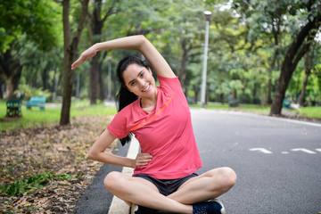 Exercise concept. Beautiful girl is stretching her muscles. Beautiful girls are warming up before running.