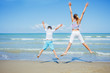 © Max Topchii - Adorable kids have fun on the beach.
