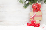 Fototapeta Mapy - Christmas gift boxes and xmas fir tree